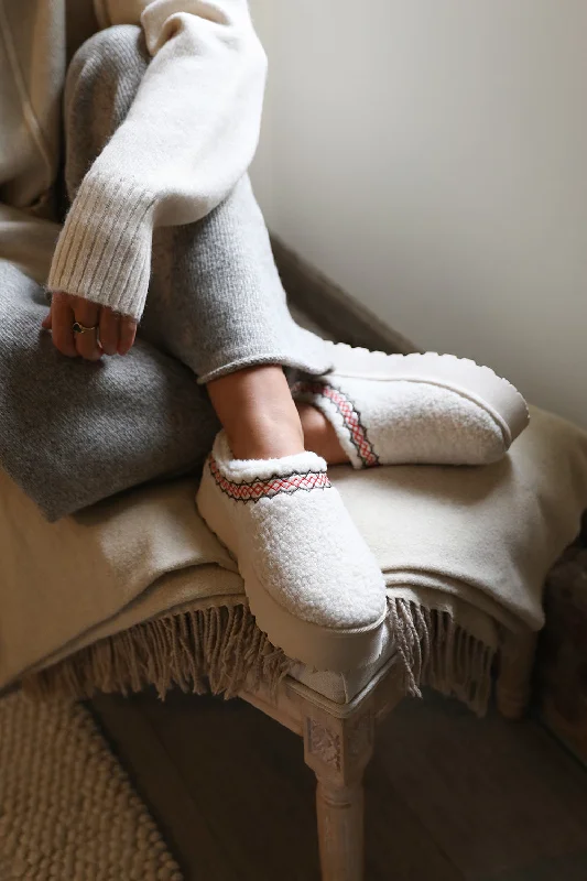 Slippers with grip base -CHERRY FLATFORM AZTEC DETAIL LOW ANKLE SLIPPER BOOTS IN CREAM SHEARLING