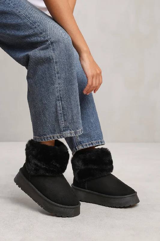 Slip-on slippers for quick calm -CLARA ANKLE SLIPPER BOOT WITH FAUX FUR LINING AND TRIM IN BLACK