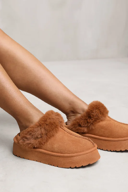 Slippers for indoor naps -MAYA SLIDE ON SLIPPER WITH FAUX FUR LINING IN CAMEL